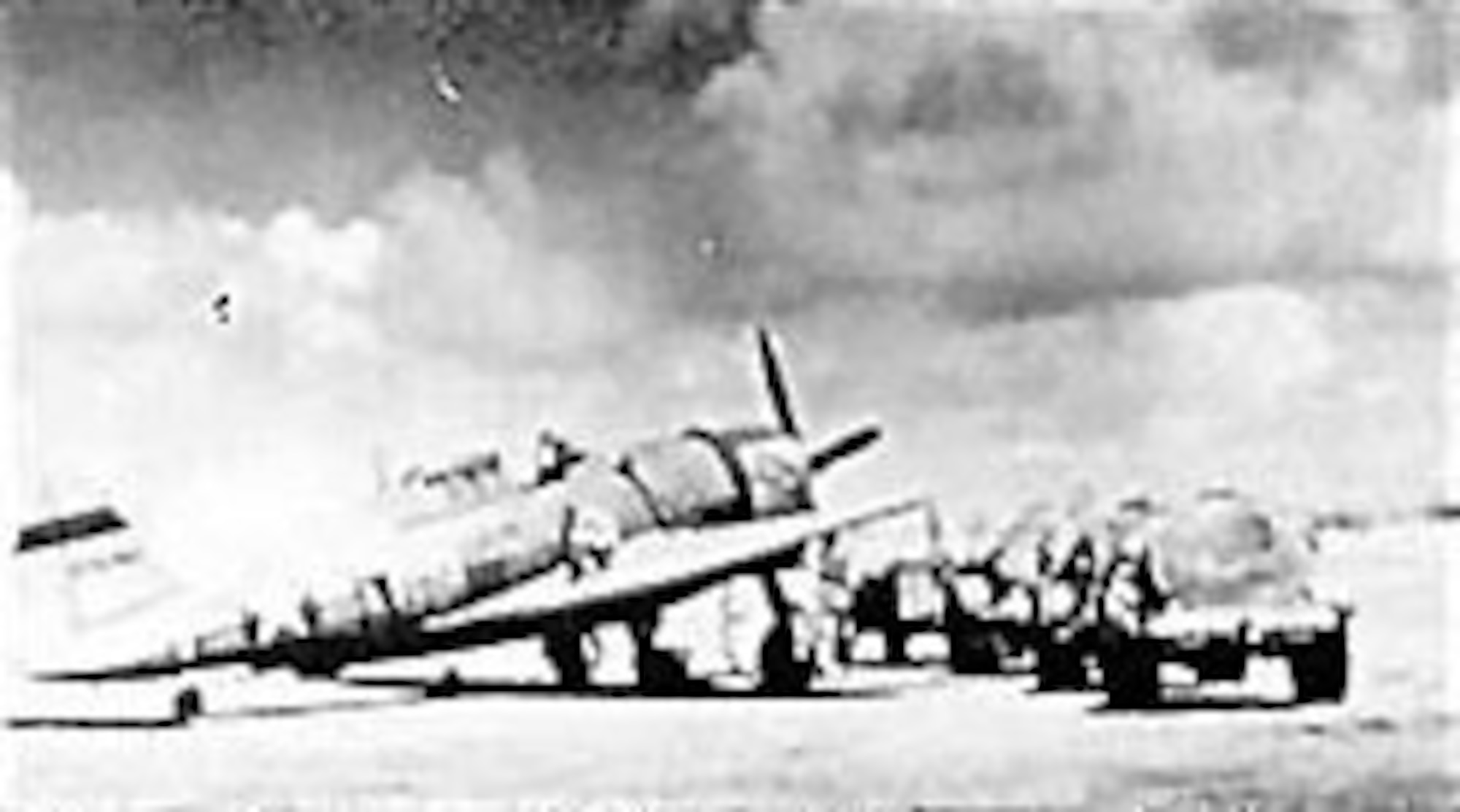 Ground crewmen fuel a P-47 on an airstrip on Saipan prior to its next bombing mission against Japanese positions on nearby Rota Island. (U.S. Air Force photo)