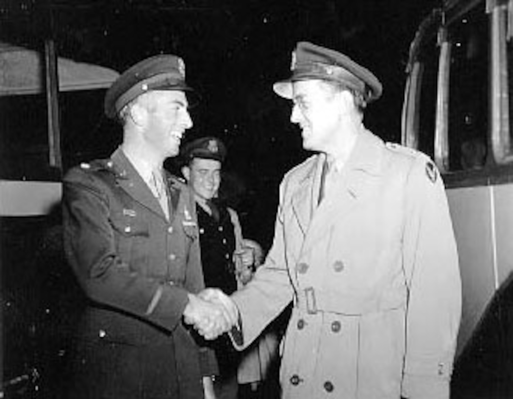 Maj. Glenn Miller greets some soldiers. (U.S. Air Force photo)