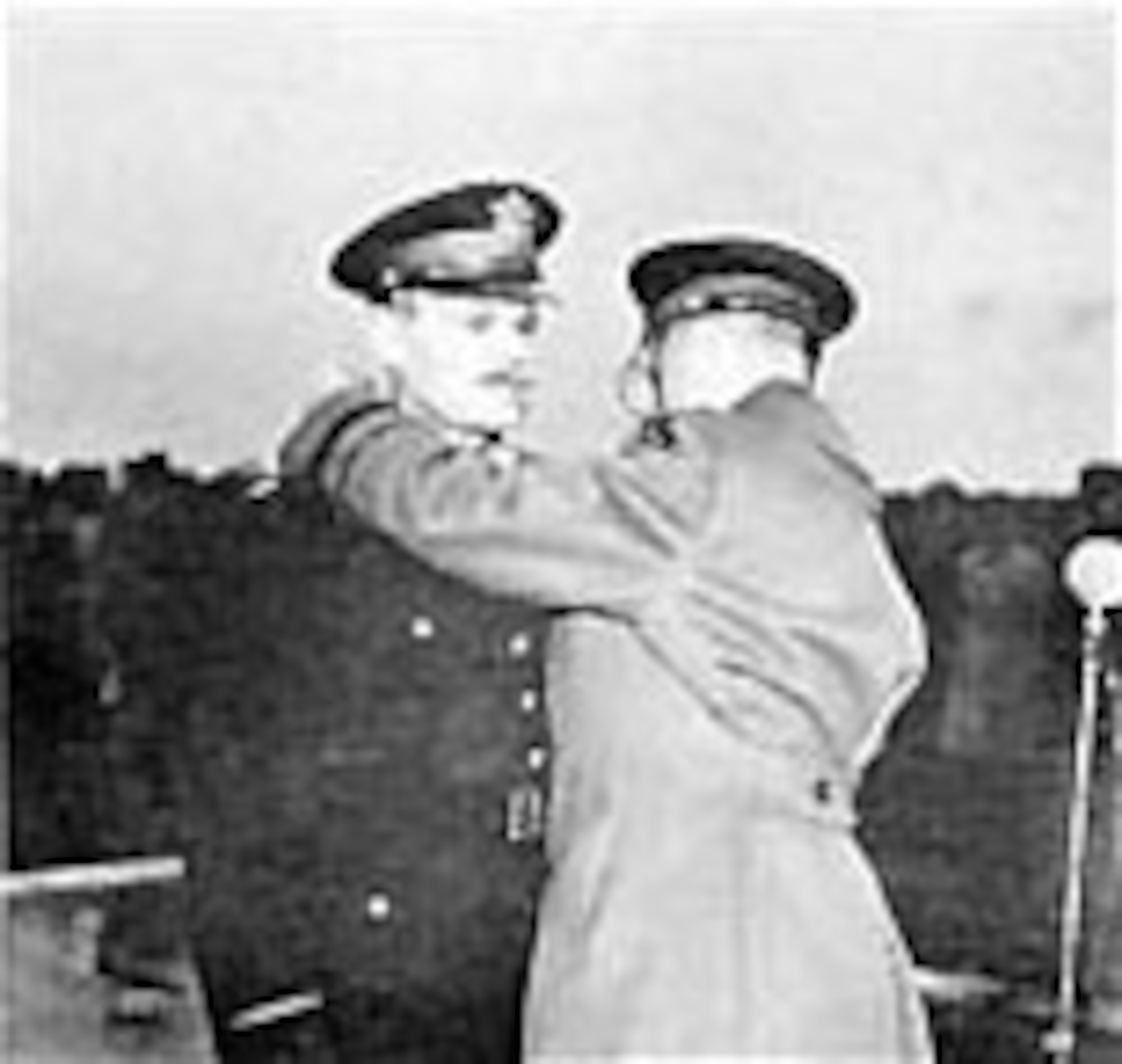 Col. Leon W. Johnson receives the Medal of Honor from Lt. Gen. Devers. (U.S. Air Force photo)