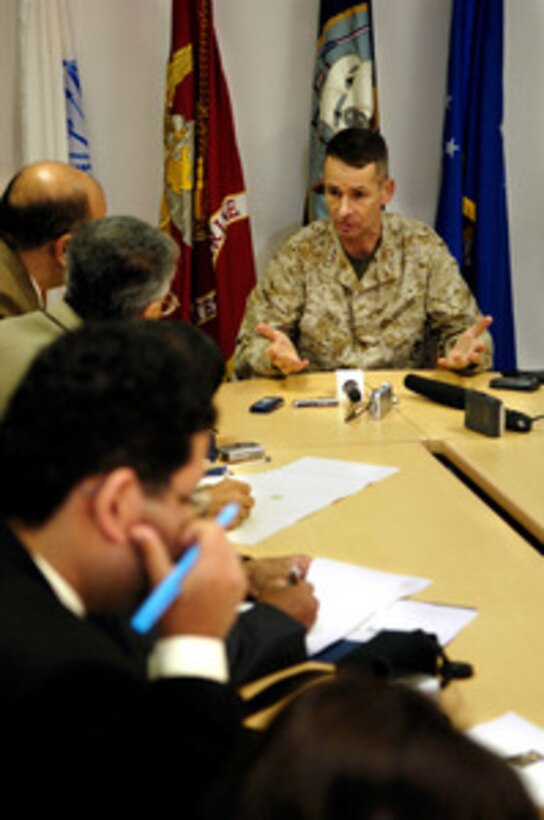 Chairman of the Joint Chiefs of Staff Gen. Peter Pace, U.S. Marine Corps, talks to reporters at the U.S. Naval Support Activity in Manama, Bahrain, on Dec. 29, 2005. A USO-sponsored troupe including 2004 American Idol finalist Diana DeGarmo, country music star Michael Peterson and comedian and actor Reggie McFadden is traveling with Pace as he visits troops deployed during the holiday season. 