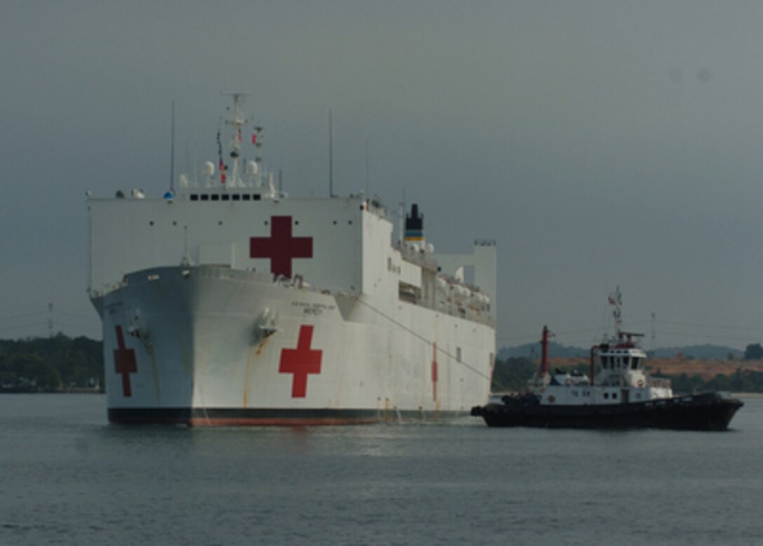 The hospital ship USNS Mercy (T-AH 19) arrives in Singapore to take on supplies and personnel before transiting to the Indian Ocean in support of Operation Unified Assistance on Jan. 29, 2005. The Mercy contains 12 fully equipped operating rooms and 1,000 hospital beds. Operation Unified Assistance is a multi-national humanitarian aid effort in the wake of the Dec. 26, 2004, Indian Ocean tsunami. 