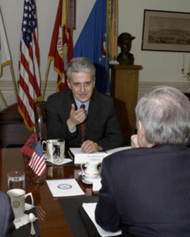 Albanian Minister of Defense Pandeli Majko meets with Secretary of Defense Donald H. Rumsfeld (foreground) in the Pentagon on Feb. 2, 2005. Majko and Rumsfeld are meeting to discuss issues of mutual interest. 