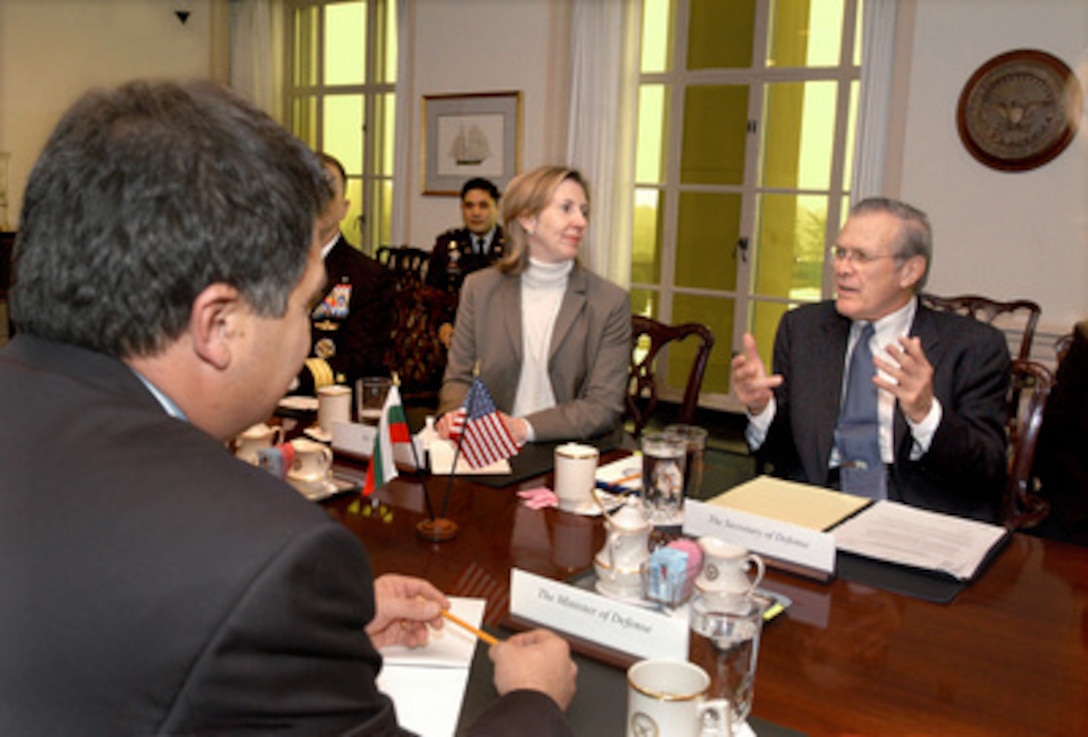 Secretary of Defense Donald H. Rumsfeld (right) hosts a Pentagon meeting with Bulgarian Minister of Defense Nikolai Svinarov (foreground) on Feb. 3, 2005. Under discussion is a range of bilateral security issues of particular interest as the NATO defense ministerial will be held later this month. Among those participating in the talks is Acting Assistant Secretary of Defense for International Security Policy Mira Ricardel (center). 