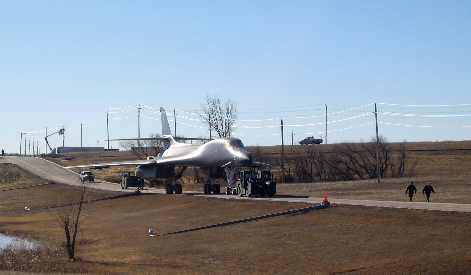 ELLSWORTH AIR FORCE BASE, S.D. -- Airmen move a B-1B Lancer is moved from the flightline here to the South Dakota Air and Space Museum for a permanent display.  (U.S. Air Force photo by 1st Lt. Elizabeth De Jesus) 