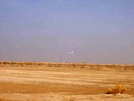 TALLIL AIR BASE, Iraq -- A Desert Hawk returns after patrolling the sky over here.  The Desert Hawk is a miniature unmanned aerial vehicle used by security forces to see beyond base perimeters providing a rapid assessment of threats.  (Courtesy photo)