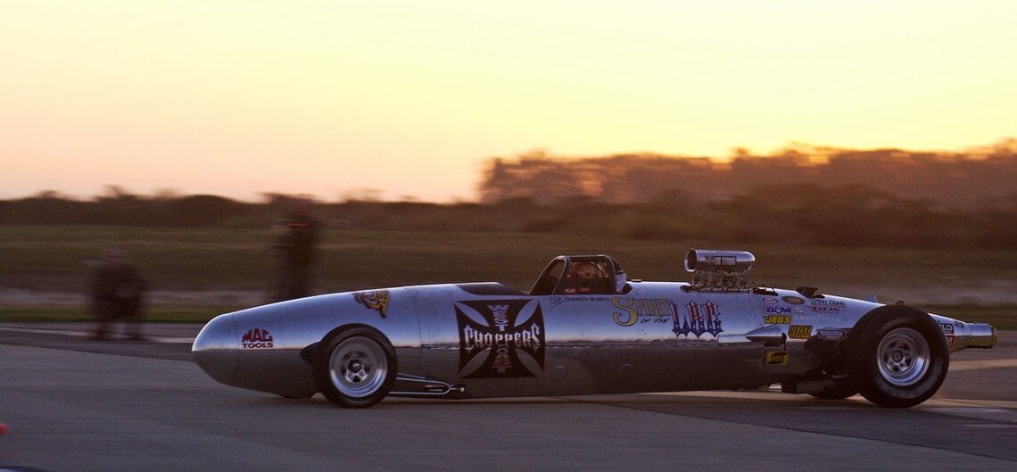 VANDENBERG AIR FORCE BASE, Calif. -- The Belly Tank Lakester, piloted by Jesse James of the TV show "Monster Garage," flies down the runway here recently during the taping of a speed run for an upcoming show.  The car was made out of a drop tank from an F-4 Phantom.  (U.S. Air Force photo by Airman Barry Loo) 