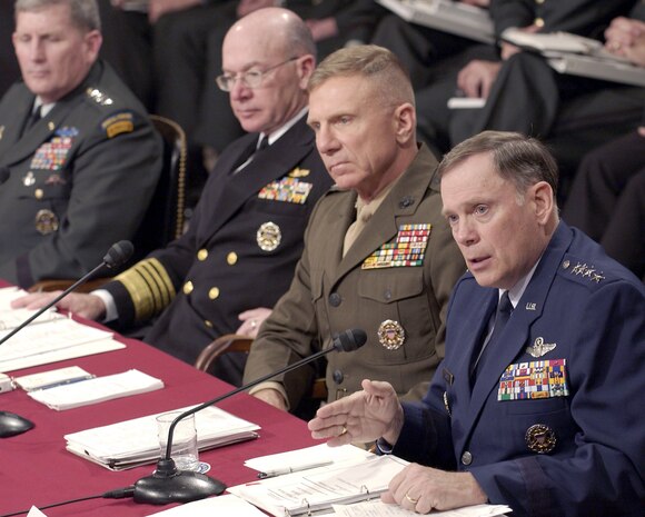 WASHINGTON -- Service chiefs answer questions during a hearing of the Senate Committee on Armed Services here Feb. 10.  They are (from left) Army Chief of Staff Gen. Peter J. Schoomaker, Chief of Naval Operations Adm. Vernon E. Clark, Marine Corps Commandant Gen. Michael W. Hagee and Air Force Chief of Staff, Gen. John P. Jumper.  The committee heard testimony on the fiscal 2006 defense authorization request.  (U.S. Air Force photo by Master Sgt. Jim Varhegyi)