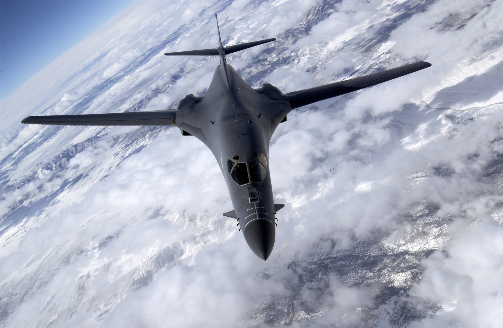 AIRBORNE -- The B-1B Lancer cruises above the clouds. A B-1B test program that combined testing of software upgrades, along with integrating the 500-pound Joint Direct Attack Munition wrapped up here Feb. 24. (U.S. Air Force photo by Master Sgt. Lance Cheung)