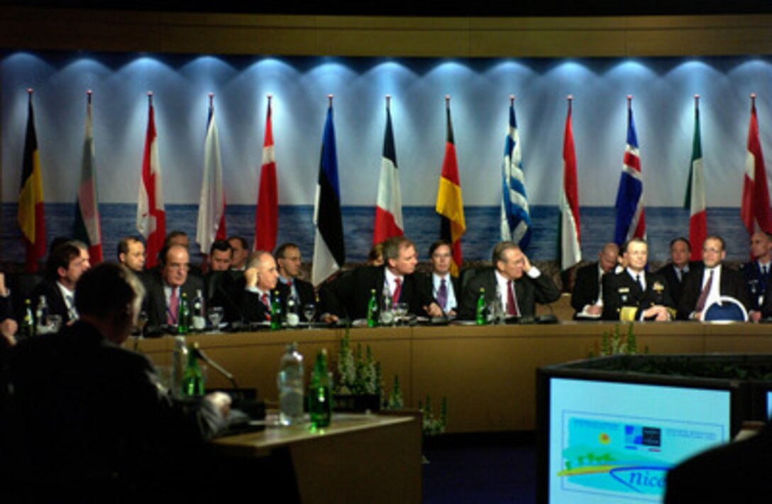 Secretary of Defense Donald H. Rumsfeld listens to a presentation at the NATO Defense Ministerial Conference in Nice, France, on Feb. 10, 2005. Rumsfeld is in Nice to attend a conference with his NATO counterparts. The alliance defense ministers are meeting to take stock of NATO's transformation and review its operations. 