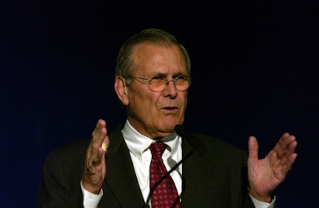 Secretary of Defense Donald H. Rumsfeld gestures to make a point as he holds a press conference following the NATO Defense Ministerial Conference in Nice, France, on Feb. 10, 2005. Rumsfeld is in Nice to attend the conference with his NATO counterparts. The alliance defense ministers met to take stock of NATO's transformation and review its operations. 