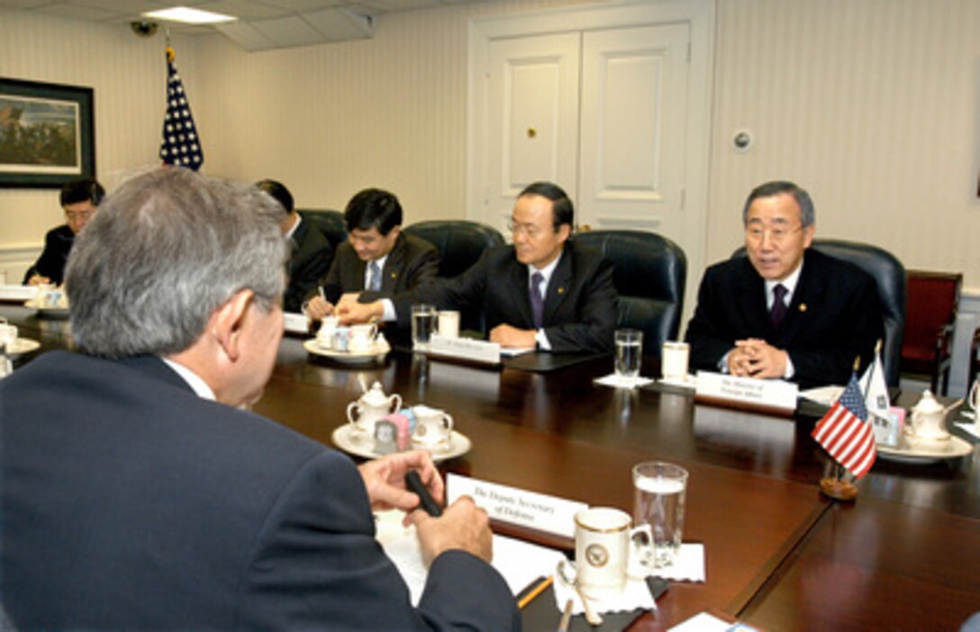 South Korean Minister of Foreign Affairs and Trade Ban Ki-moon (right) meets with Deputy Secretary of Defense Paul Wolfowitz (foreground) in the Pentagon on Feb. 14, 2005. Ban, Wolfowitz and their senior advisors are meeting to discuss bilateral security issues. Deputy Minister of Foreign Affairs He Song Min-soon (center) and Director General for the Task Force on North Korean Nuclear Issues Cho Tae-Yong (far side left) also participated. 