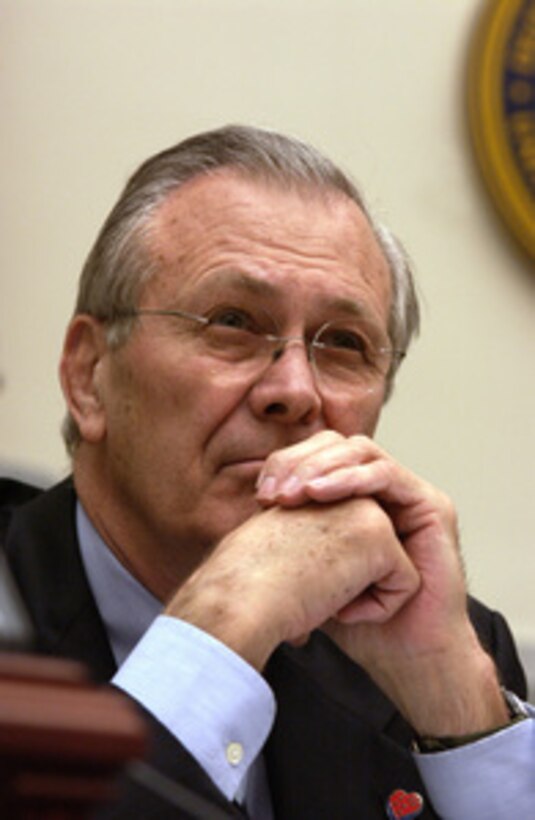 Secretary of Defense Donald H. Rumsfeld listens to a representative's question during a House Armed Services Committee hearing in the Rayburn House Office Building in Washington, D.C., on Feb. 16, 2005. Chairman of the Joint Chiefs of Staff Gen. Richard B. Myers, U.S. Air Force, and Under Secretary of Defense Comptroller Tina Jonas joined Rumsfeld in testifying before the committee. 