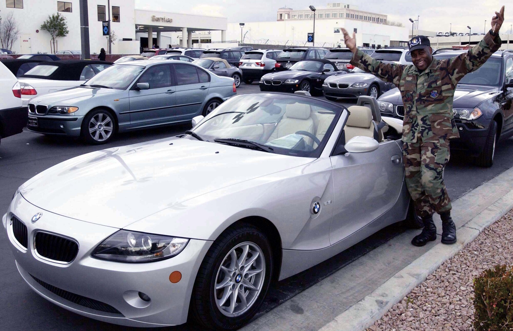 LAS VEGAS -- Second Lt. Eric Mason visits a local dealership to check out the BMW he won on the 'Wheel of Fortune.'  He is assigned to the 99th Logistics Readiness Squadron at nearby Nellis Air Force Base, Nev.  (U.S. Air Force photo by Airman Jeffery Hall)

