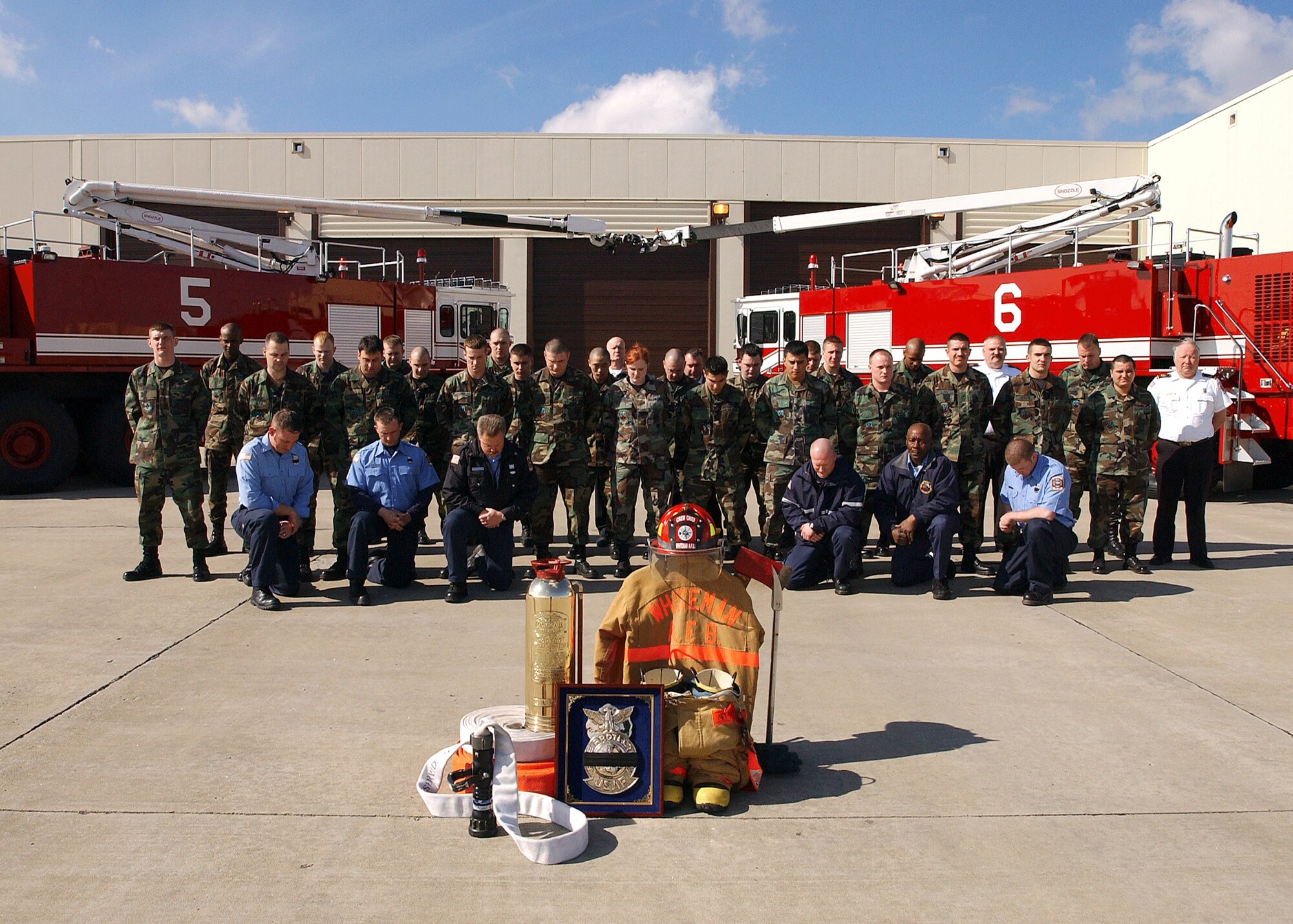 WHITEMAN AIR FORCE BASE, Mo. -- Firefighters here hold a one-minute "final alarm" ceremony Feb. 16 honoring Staff Sgt. Ray Rangel who died while attempting to rescue two Soldiers after their Humvee overturned in a canal in Iraq.  (Courtesy photo)