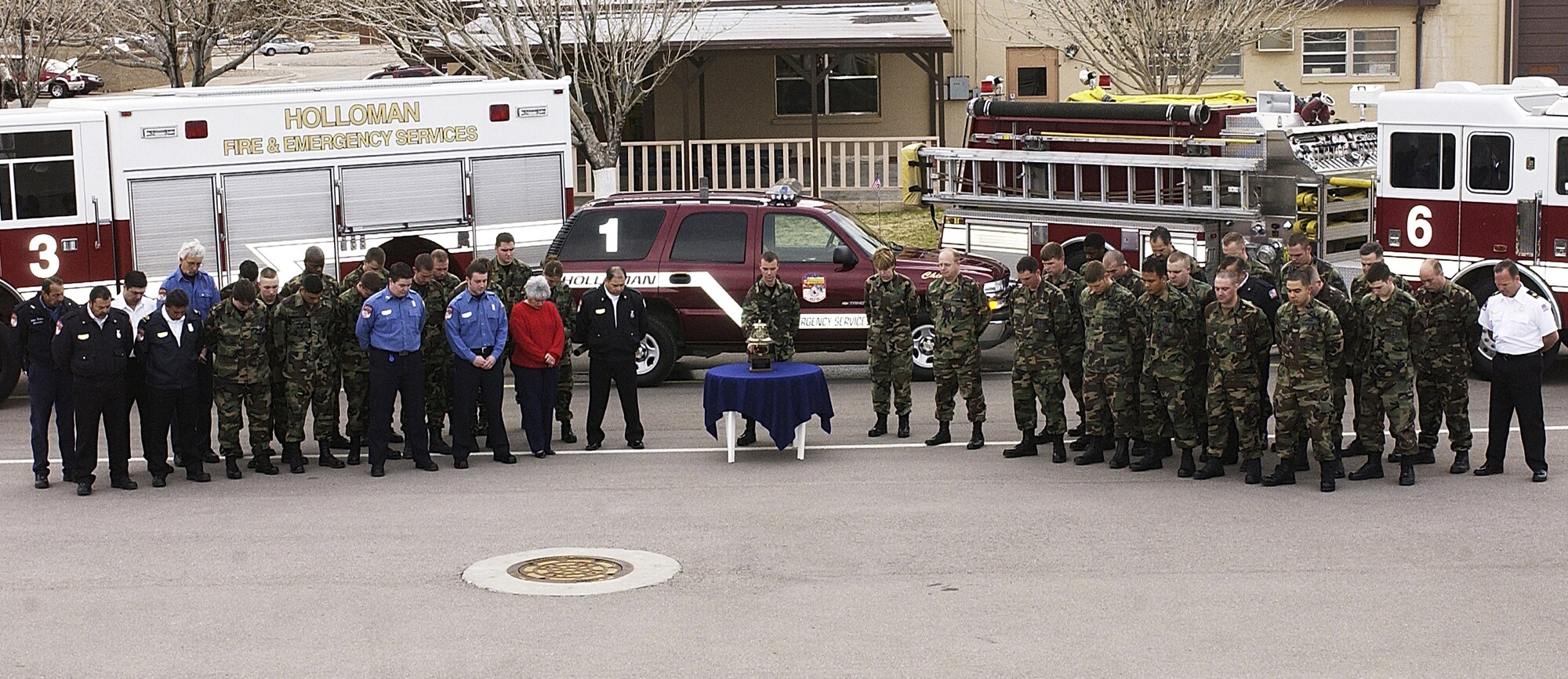 HOLLOMAN AIR FORCE BASE, N.M. -- Firefighters here hold a one-minute "final alarm" ceremony Feb. 16 honoring Staff Sgt. Ray Rangel who died while attempting to rescue two Soldiers after their Humvee overturned in a canal in Iraq.  (Courtesy photo)