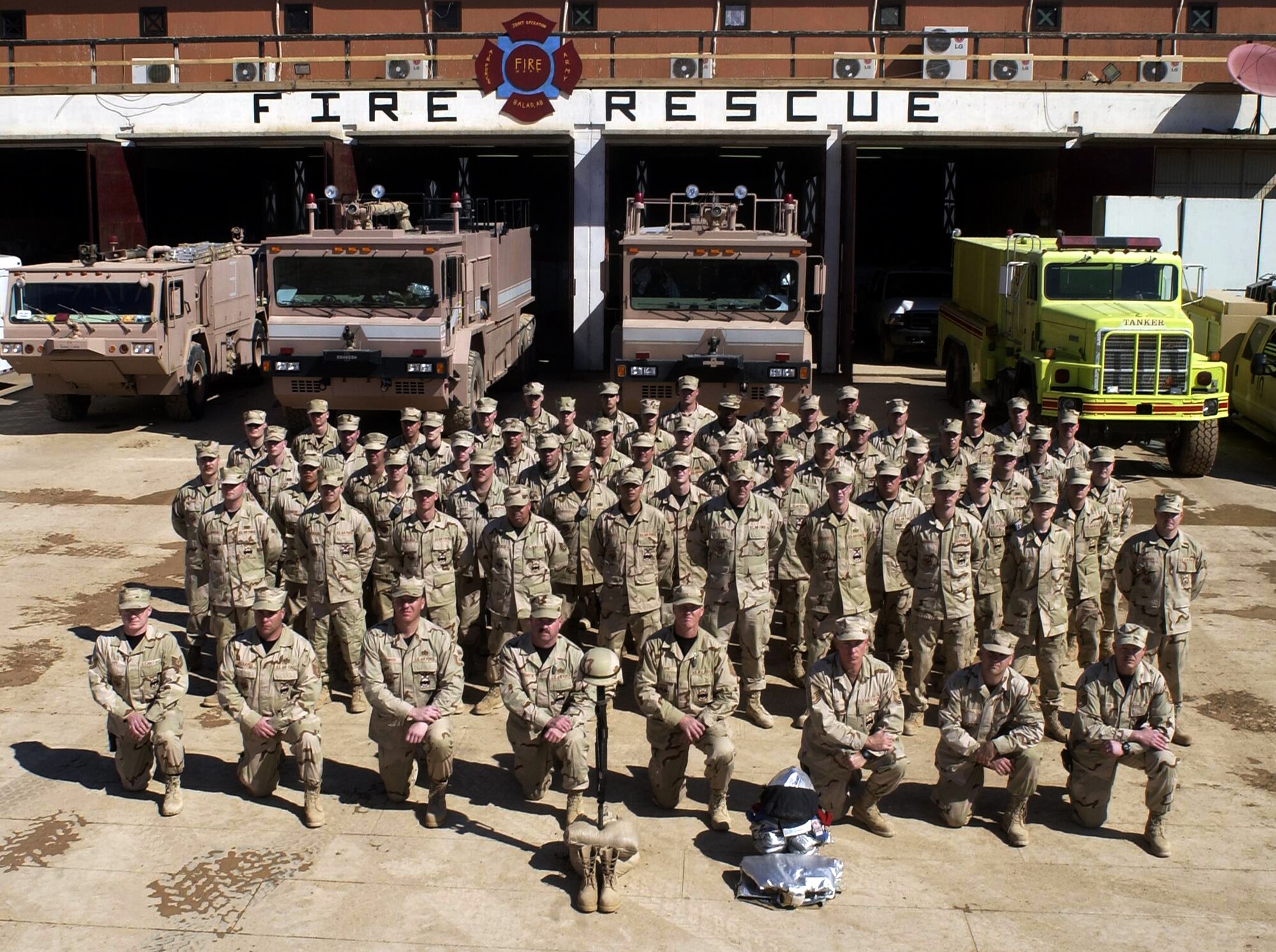 BALAD AIR BASE, Iraq -- Firefighters here hold a one-minute "final alarm" ceremony Feb. 16 honoring Staff Sgt. Ray Rangel who died while attempting to rescue two Soldiers after their Humvee overturned in a canal in Iraq.  (Courtesy photo)