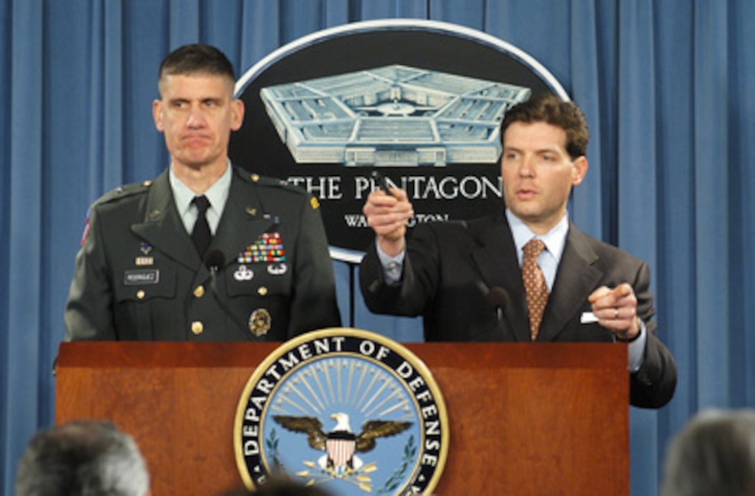 Principal Deputy Assistant Secretary of Defense for Public Affairs Lawrence Di Rita (right) announces he will take two more questions before wrapping up a Pentagon press briefing on Feb. 22, 2005. Di Rita and Deputy Director for Regional Operations for the Joint Staff Brig. Gen. David Rodriguez, U.S. Army, (left) responded to a broad range of questions from journalists. 