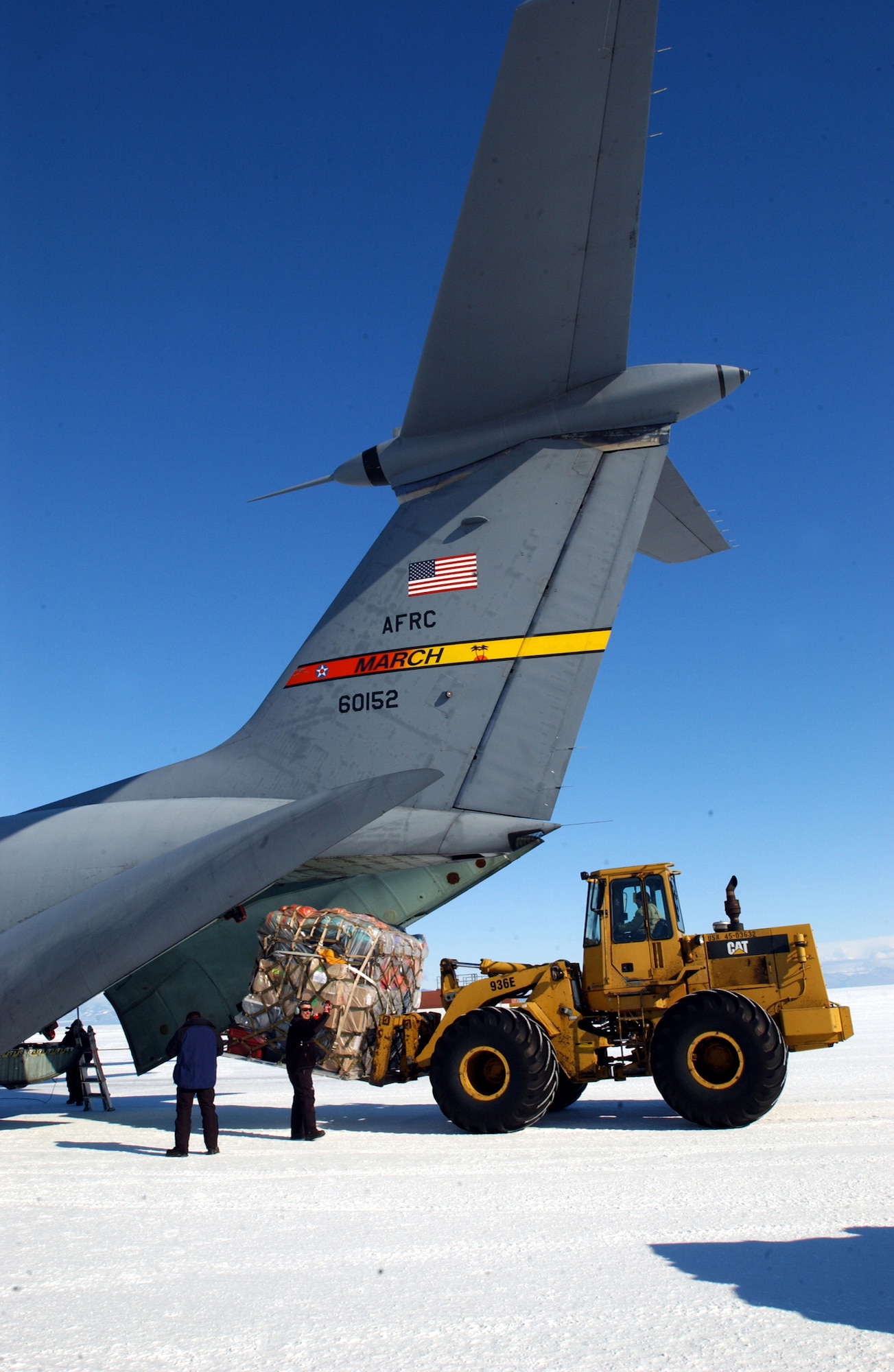 MCMURDO STATION, Antarctica -- Cargo is unloaded from a C-141 Starlifter from March Air Reserve Base, Calif., on the ice runway near here.  The crews and aircraft were flying the last Air Force Reserve mission to Antarctica supporting Operation Deep Freeze.  (U.S. Air Force photo by Tech. Sgt. Joe Zucarro)
                        