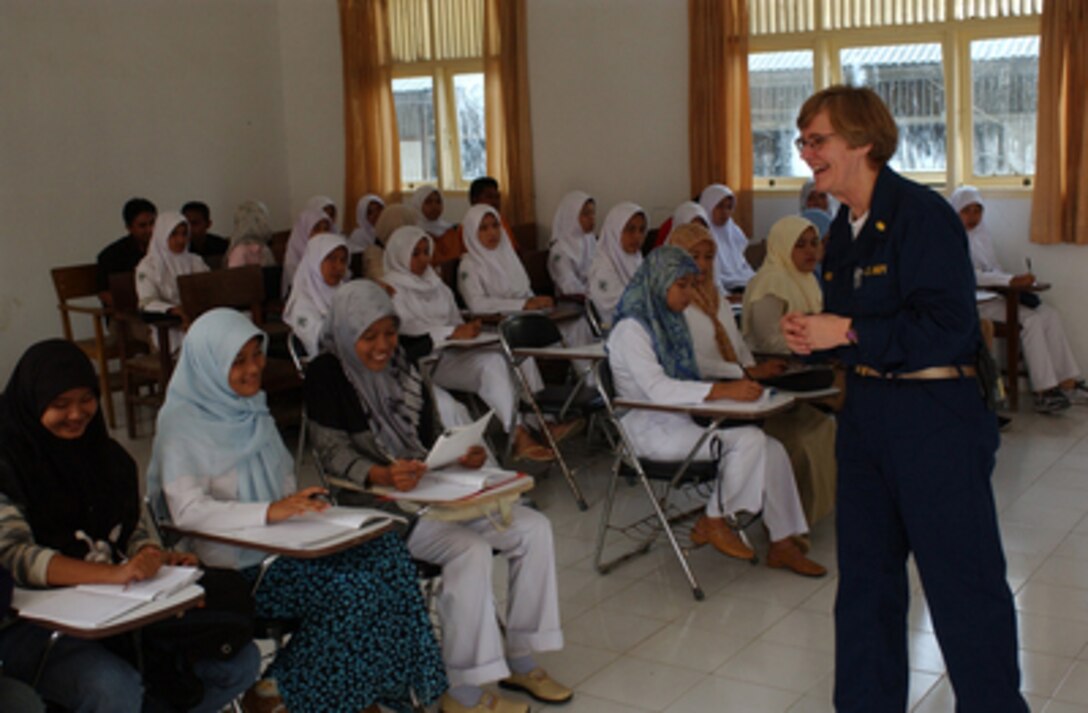 Navy Nurse Cmdr. Suzanne Clark takes questions during a lecture on diabetes nursing students at the university in Banda Aceh, Indonesia, on Feb. 23, 2005. Clark is attached to the hospital ship USNS Mercy (T-AH 19) that is currently on station off the coast of Indonesia, providing medical assistance and disaster relief in conjunction with non-governmental organizations to the people of Indonesia affected by the devastating tsunami that hit Southeast Asia on Dec. 26. 