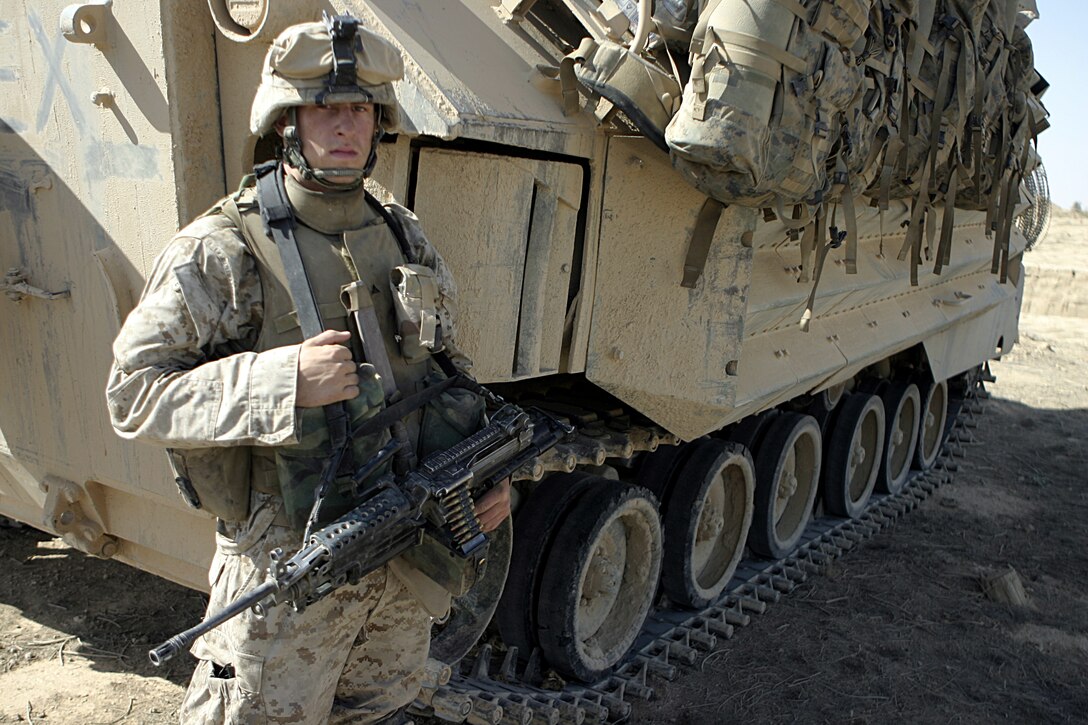 THAR THAR REGION, Iraq - Lance Cpl. Michael Harres, a squad automatic weapon gunner with 2nd Squad, 2nd Platoon, Company B, 1st Battalion, 6th Marine Regiment, is currently deployed to Iraq's Al Anbar province.  The 19-year-old Brooksville, Fla. native's unit is currently conducting security and stability operations in and around Fallujah.