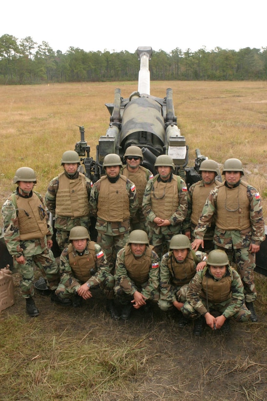 MARINE CORPS BASE CAMP LEJEUNE, N.C. (Nov. 1, 2005)- Chilean Artillery Marines trained with Marines of 10th Marine Regiment here at gun position 28. Both groups of Marines found that their way of doing things is similar. (Official U.S. Marine Corps photo by Lance Cpl. Lucian Friel (RELEASED)