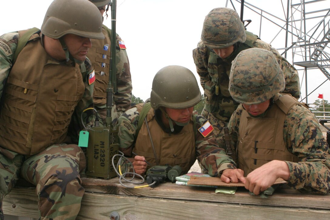MARINE CORPS BASE CAMP LEJEUNE, N.C. (Nov. 2, 2005)- Chilean Artillery Marines trained with Marines of 10th Marine Regiment here at Observation Post 2. Both groups of Marines found that their way of doing things is similar. (Official U.S. Marine Corps photo by Lance Cpl. Lucian Friel (RELEASED)