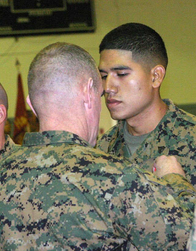 MARINE CORPS BASE CAMP LEJEUNE, N.C. (Nov. 22, 2005) - Corporal Matthew D. Palacios of Lorain, Ohio, is a prime example that these good deeds do not go unnoticed.  The combat engineer with 2nd Combat Engineer Battalion was awarded the Bronze Star medal with a combat distinguishing device here Nov. 22 for his actions during Operation Iraqi Freedom.