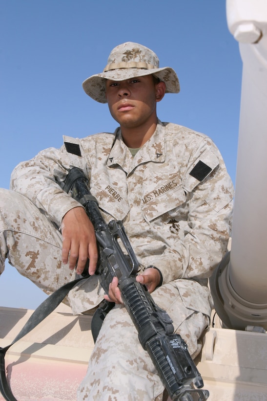 Lance Cpl. Josue Pierre, administrative clerk, Bravo Company, 2nd Tank Battalion, 2nd Marine Division, can be found working in the COC on most days, but when the battalion goes on missions outside the wire, he puts himself in the turret. Pierre said serving on deployment has been a unique experience, and feels honored to have assisted with security and stability efforts in Iraq.