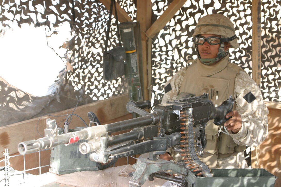 Marines from Kilo Battery, 3rd Battalion, 10th Marines reinforce the Iraqi Border Police at Waleed as they work to ensure insurgents do not cross the Syrian border into Iraq.  (Photo by LCpl Zachary W. Lester)