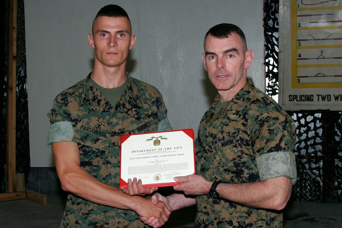 MARINE CORPS BASE CAMP LEJEUNE, N.C. - Lance Corporal William S. Parsonage, a combat engineer with Charlie Company, 2nd Combat Engineer Battalion, received the Navy and Marine Corps Achievement Medal June 3.  He was the honor graduate of class 2-05, which graduated the Sappers Leadership Course here June 3.