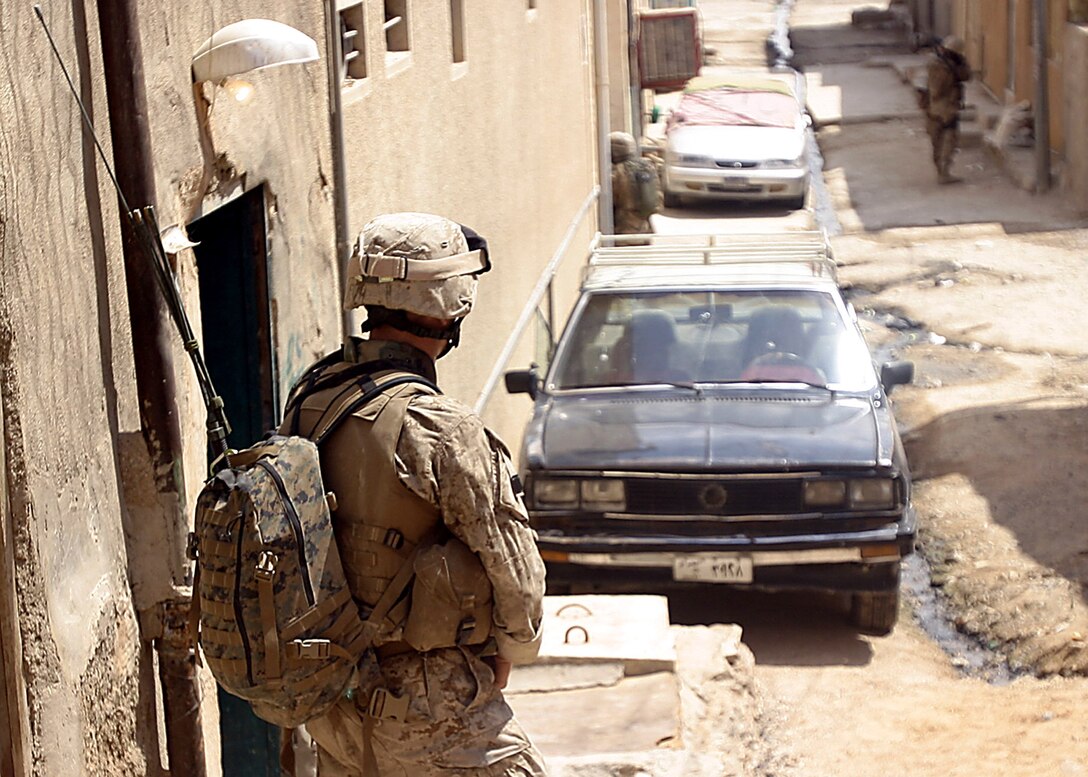 Hit, Al Anbar, Iraq (August 3, 2005)--Marines with Company "I", 3rd Battalion, 25th Marine Regiment patrol the streets. (Official USMC Photo by Corporal Ken Melton)
