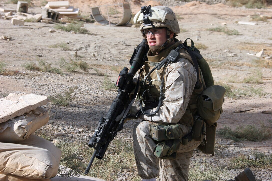 AR RAMADI, Iraq ? Lance Cpl. Scotty Tuttle, an infantryman with Company L, 3rd Battalion, 7th Marine Regiment, stands guard during Operation Shank Dec. 3.