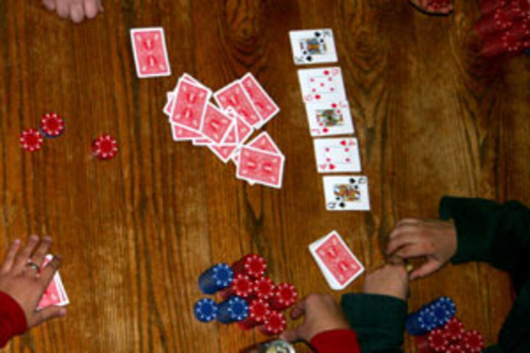 The players prepare to make a final bid after the "river" card is turned over. The "river" card is the last card to be turned over in every hand.