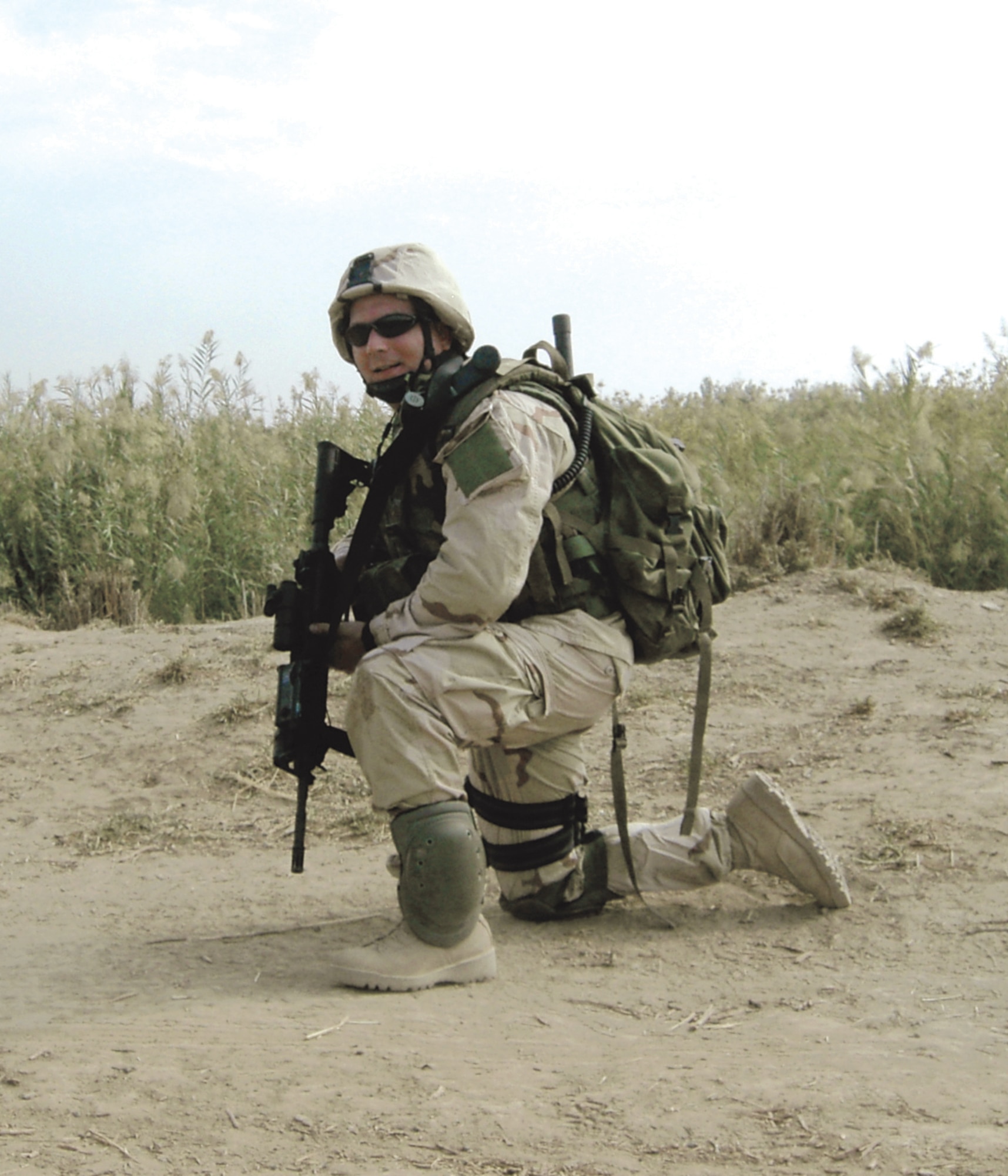 BALAD AIR BASE, Iraq -- Senior Airman Jeff Varnum goes out on a combat patrol outside Balad.  He is a joint terminal attack controller with the 116th Expeditionary Air Support Operations Squadron.  (Courtesy Photo)