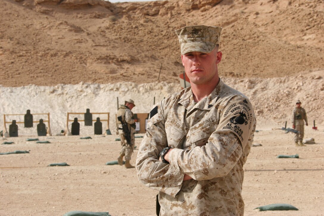 AL ASAD, Iraq ? Corporal Brandon Upton, range operations noncommissioned officer with 2nd Low Altitude Air Defense Battalion spends his days training Marine and Army units proper weapons techniques with any small arms from a pistol to machine guns.