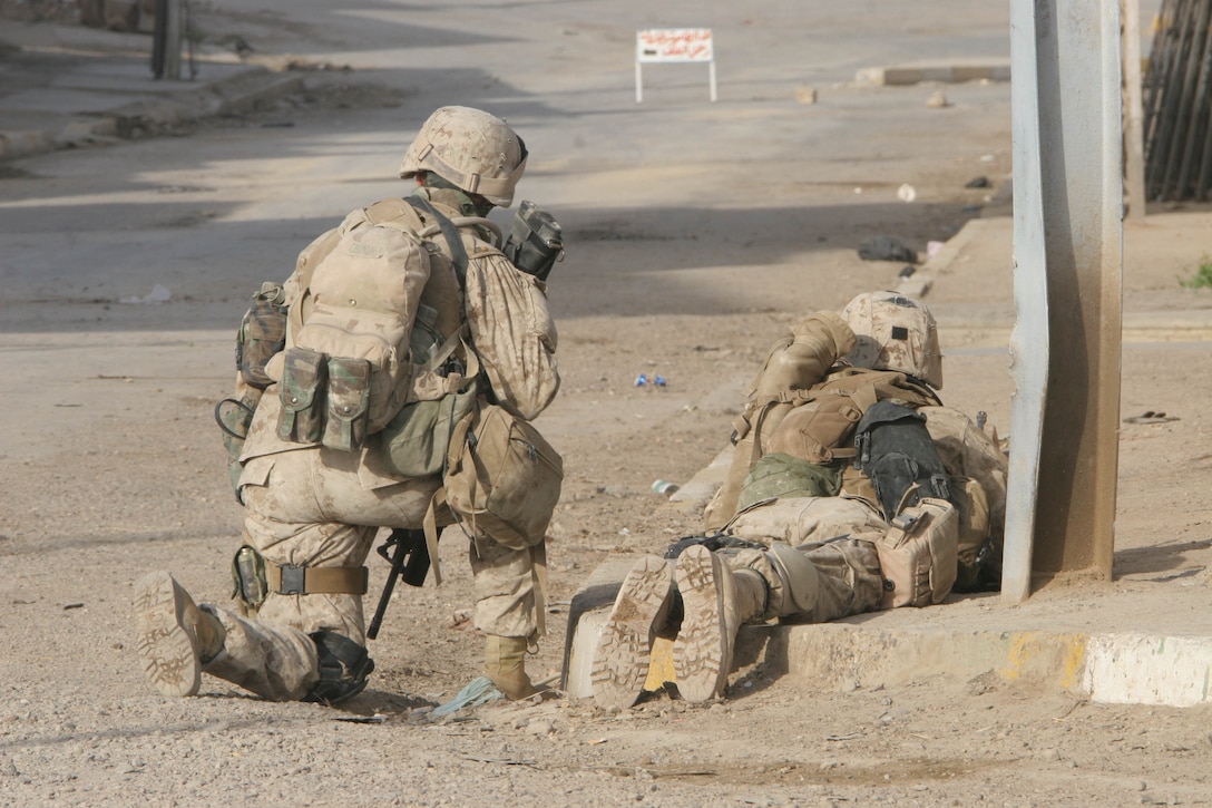 HIT, Iraq (July 4, 2005)- Marines with 1st Platoon, Company K, 3rd Battalion, 25th Marine Regiment, Regimental Combat Team-2 spend American Independence Day conducting patrols to keep the streets safe during Operation Guardian Sword conducted to clear the city and set-up Iraqi Security Forces firm bases through out the city. (Official USMC photo by Lance Cpl. Lucian Friel )(NOT RELEASED)
