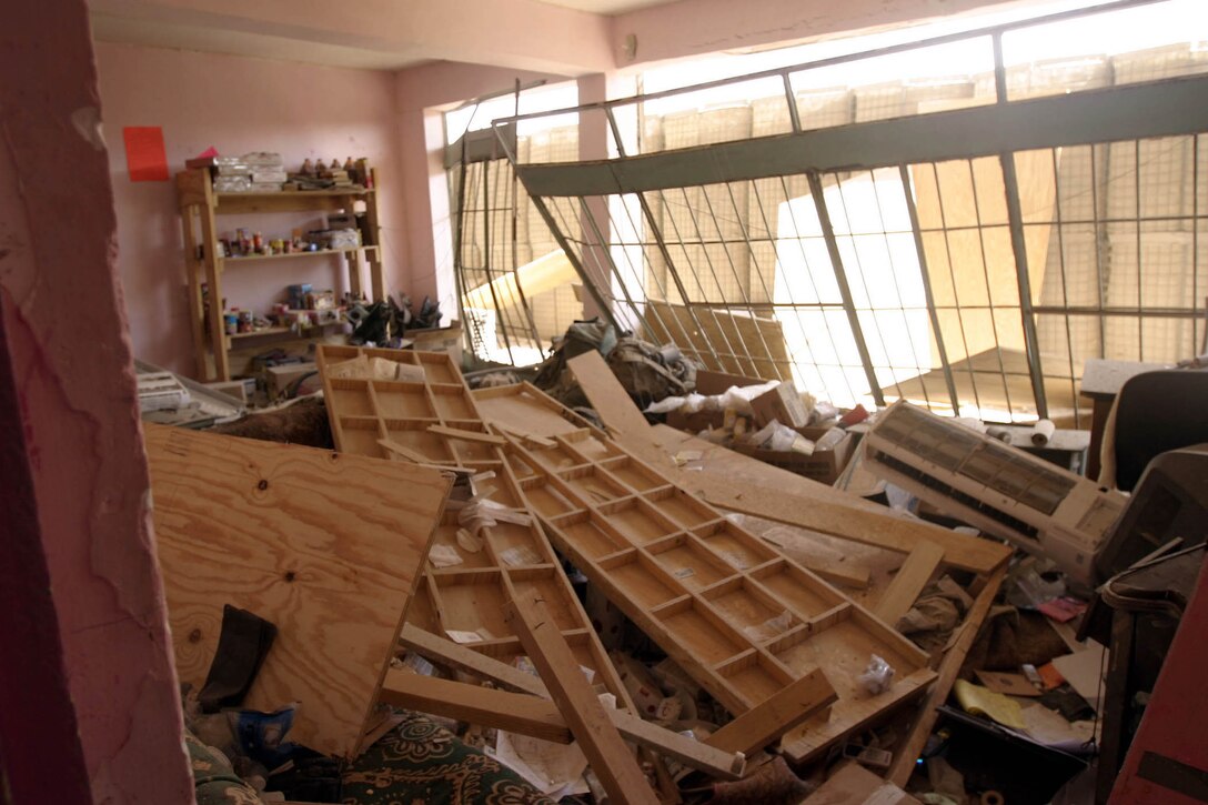 Hit, Iraq (September 4, 2005)-- The damage left by an the SVBIED used in an attack on Company "I", 3rd Battalion, 25th Marines after an attack by insurgents  disrupted civilians receiving money from multinational forces damaged a bridge, a caused more than 40 WIAs, one KIA to multinational forces and eight civilian casualties. (Official USMC Photo by Corporal Ken Melton)