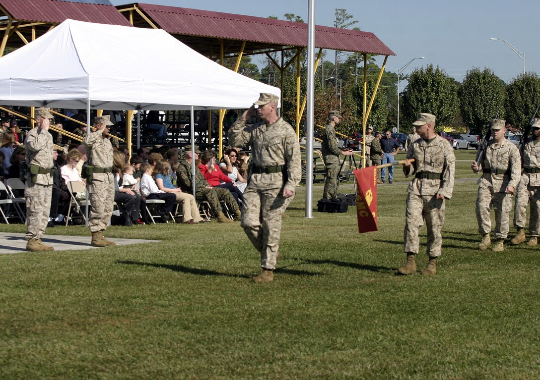 MARINE CORPS BASE CAMP LEJEUNE, N.C. - Second Battalion, Eighth Marine Regiment personnel pass in review before Lt. Col. Kenneth M. DeTreux, the battalion's new commander, and Lt. Col. Robert G. Petit, the outgoing commander, after a change of command ceremony here Nov. 4.  DeTreux, a native of Philadelphia, assumed command of "America's Battalion" to prepare his Marines for a deployment to Iraq in 2006.
