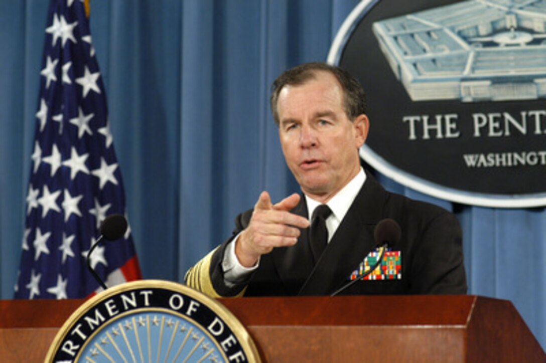 Commander of U.S. Pacific Command Adm. Thomas B. Fargo, U.S. Navy, calls on a reporter during a briefing in the Pentagon on Jan. 4, 2005. Fargo briefed reporters on the increasing levels of support being allocated to help the citizens of nations affected by the recent tsunamis. 