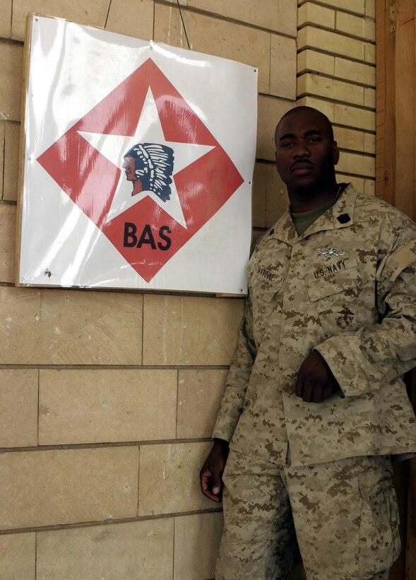 CAMP BAHARIA, Iraq - Hospitalman 3rd Class Troy Antoine, a corpsman with 1st Battalion, 6th Marine Regiment's battalion aid station, was one of four 'docs' who received a Fleet Marine Force Warfare pin here July 5.  The 28-year-old Brooklyn, N.Y. native and fellow sailors were recognized for their mastery of Marine concepts, ranging from military history, to weapons employment, to infantry tactics.