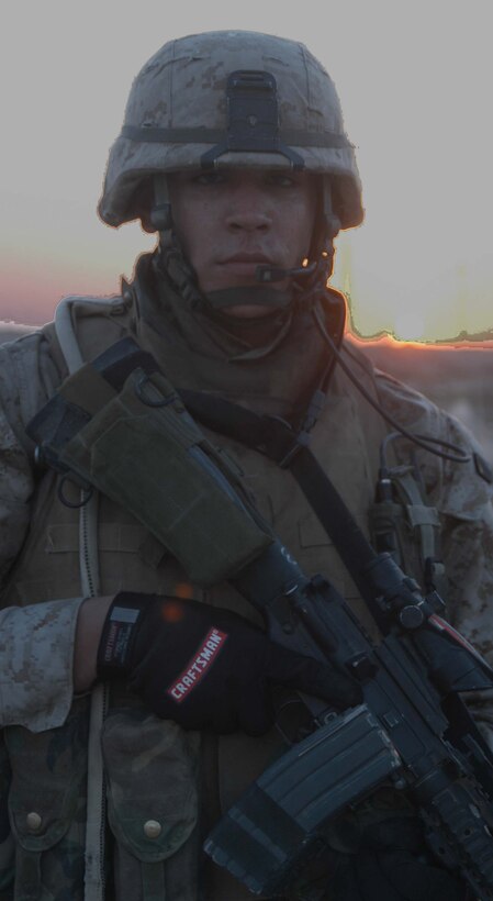 AR RAMADI Iraq (July 22, 2005) - Corporal Kelly P. Baker, a rifleman and team leader with 2nd Squad, 1st Platoon, Company C, 1st Battalion, 5th Marine Regiment, is a third generation American Indian serving in the Marine Corps during a time of conflict. The 21-year-old from New Town - a city inside Ft. Berthold Indian Reservation in North Dakota - is descendant of affiliated Great Plains tribes Mandan, Hidasta and Arikara. His grandfather, Clyde Baker, served during World War II and fought in the Battle of Okinawa. His father Hugh served during Vietnam. Both left the Corps as corporals.