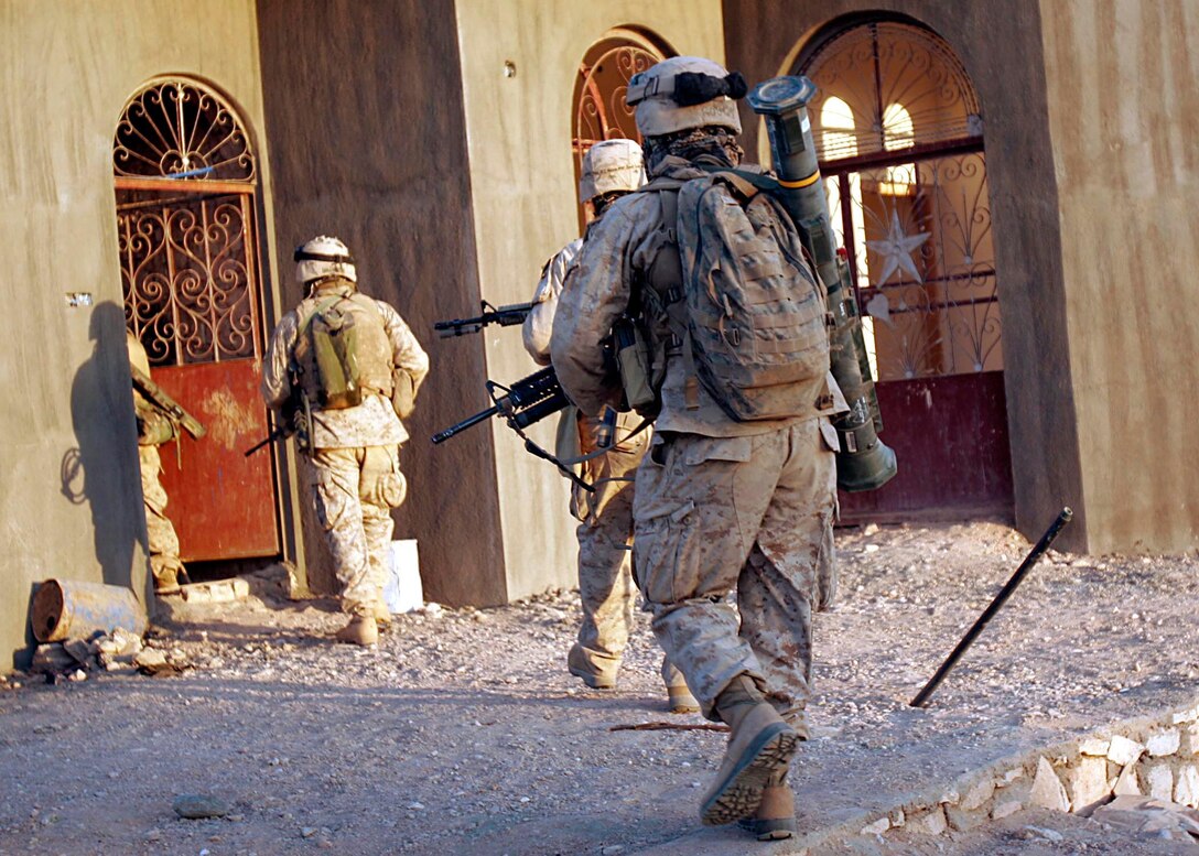 Husaybah, Iraq ( November 5, 2005)--Scouts with 2nd platoon, 1st LAR conduct house searches as part of Operation Steel Curtain. The scouts would later find a boobytrap house during their patrol. (Official U. S. Marine Corps photo by Corporal Ken Melton)