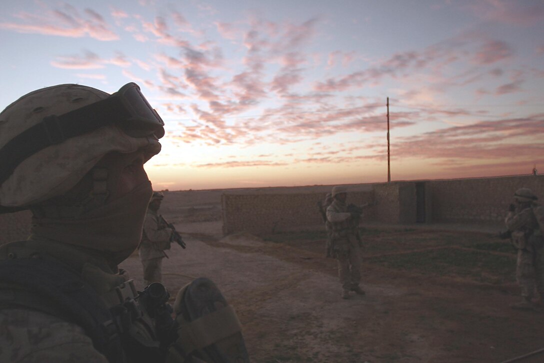 Husaybah, Iraq ( November 5, 2005)--Scouts with 2nd platoon, 1st LAR conduct house searches as part of Operation Steel Curtain. The scouts would later find a boobytrap house during their patrol. (Official U. S. Marine Corps photo by Corporal Ken Melton)