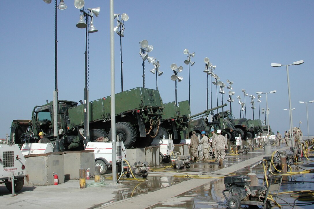 A group of tactical vehicles sit staged during the 15th Marine Expeditionary Unit (Special Operations Capable) wash down. The unit recently completed their second combat tour in Iraq.