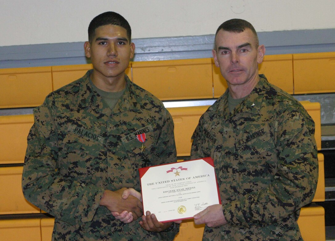 MARINE CORPS BASE CAMP LEJEUNE, N.C. (Nov. 22, 2005) - Corporal Matthew D. Palacios of Lorain, Ohio, is a prime example that these good deeds do not go unnoticed. The combat engineer with 2nd Combat Engineer Battalion was awarded the Bronze Star medal with a combat distinguishing device here Nov. 22 for his actions during Operation Iraqi Freedom.