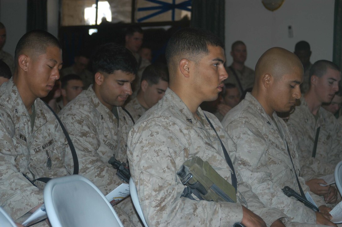 CAMP HURRICANE POINT Ar Ramamdi, Iraq (April 7, 2005) - Marines with Company W, 1st Battalion, 5th Marine Regiment, attended a memorial ceremony here to honor one of their fellow warriors who fell on the battlefield, Cpl. Garry W. Rimes. The 30-year-old rifleman and scout with 2nd Platoon, Company W, 1st Battalion, 5th Marine Regiment, was killed by enemy sniper fire while fighting the Global War on Terrorism. Rimes, from Rizal, Philippines, is survived by his wife, Happy. Photo by Cpl. Tom Sloan