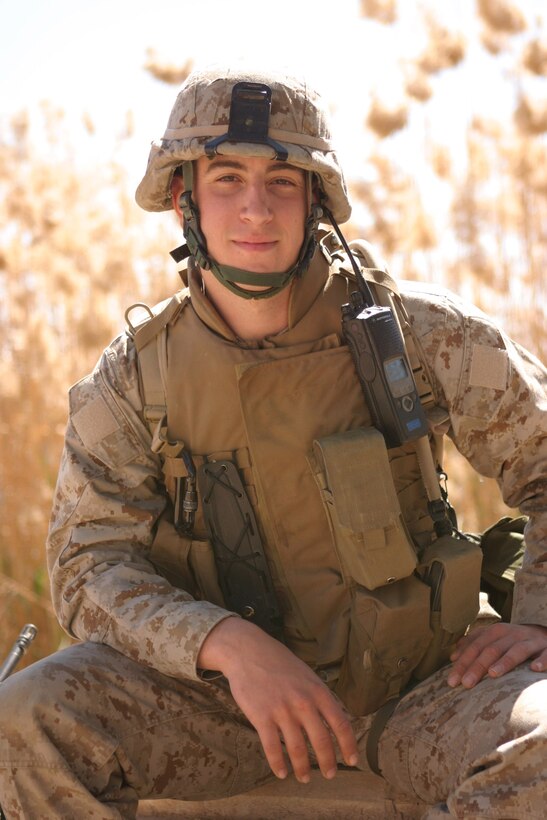 CAMP BLUE DIAMOND, AR RAMADI, Iraq -- Catinella, a 20-year old, Smithtown, N.Y. native from Long Island is a trumpeter in the 2nd Marine Division Band based at Camp Lejeune, N.C.  Nearly one year ago, he set his brass aside and picked up a rifle to train as a fire team leader for the division's forward deployed headquarters.  U.S. Marine Corps photo by Sgt. Stephen D'Alessio (RELEASED)