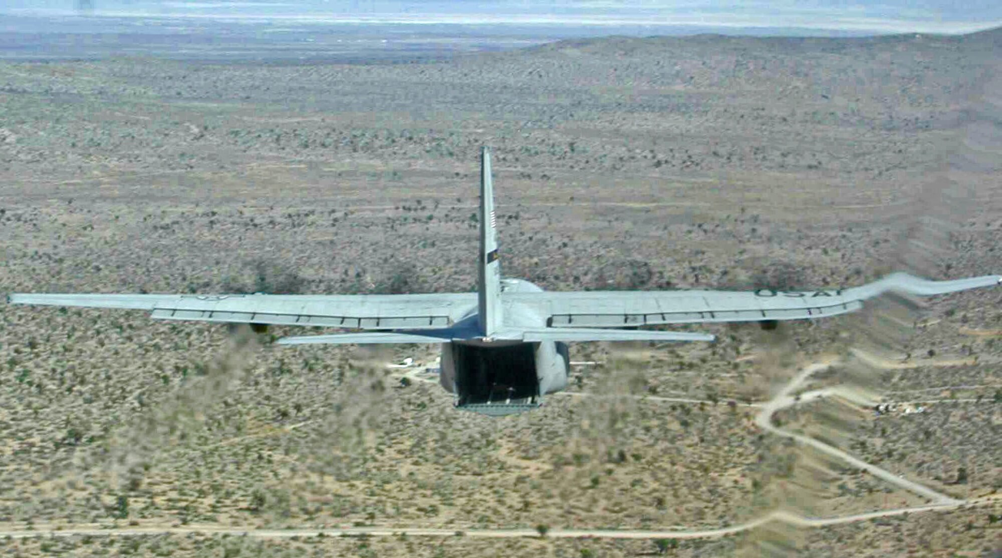 OVER EDWARDS AIR FORCE BASE, Calif. -- A C-130J Hercules aircrew recently tested an upgraded software program which will allow the cargo aircraft to carry heavier payloads.  (Courtesy photo)