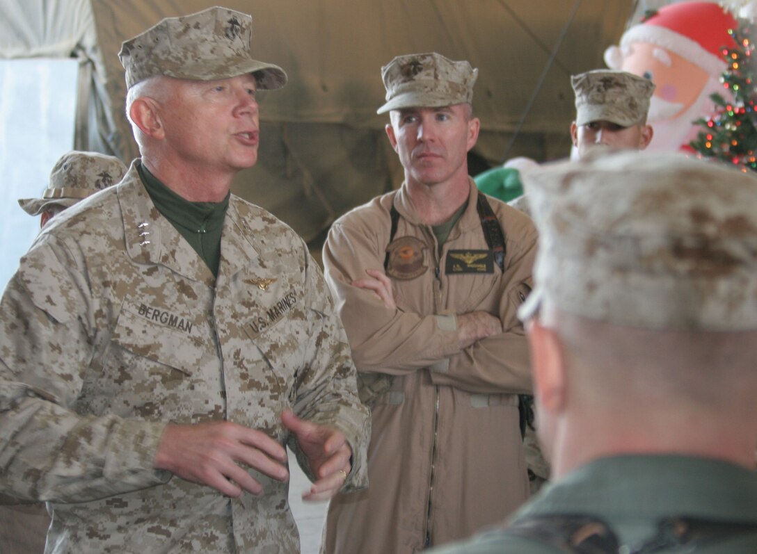 Lieutenant Gen. John W. Bergman, the commander of Marine Forces Reserve, answers questions from Marines with Marine Medium Helicopter Squadron 774 at Al Asad, Iraq, Dec. 7. For two years, and two consecutive holiday seasons, Marine Medium Helicopter Squadron 774 has been deployed in support of Operation Iraqi Freedom.