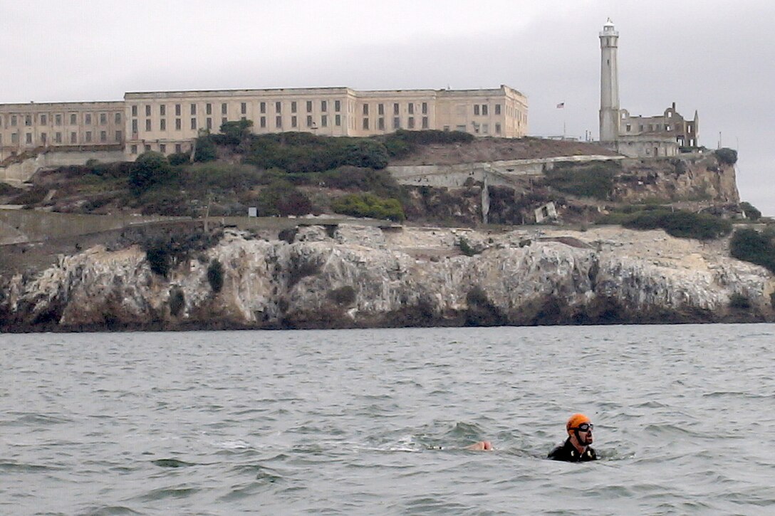 MARINE CORPS BASE CAMP LEJEUNE, N.C. - Jay Platt, a retired Marine Corps gunnery sergeant, recently swam from Alcatraz Island to San Francisco with his hands and feet tied to raise awareness for the Injured Marine Semper Fi Fund. He completed the 1.66 mile swim in 1 hour and 55 minutes. Photo by:  Official Marine Corps Photo